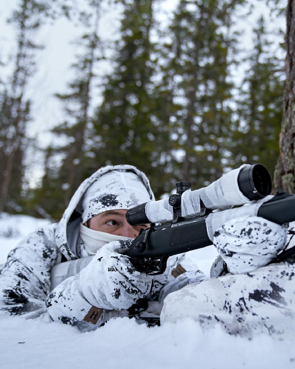 AXIS Snow Coloured Harkila Winter Active WSP Jacket on snow background