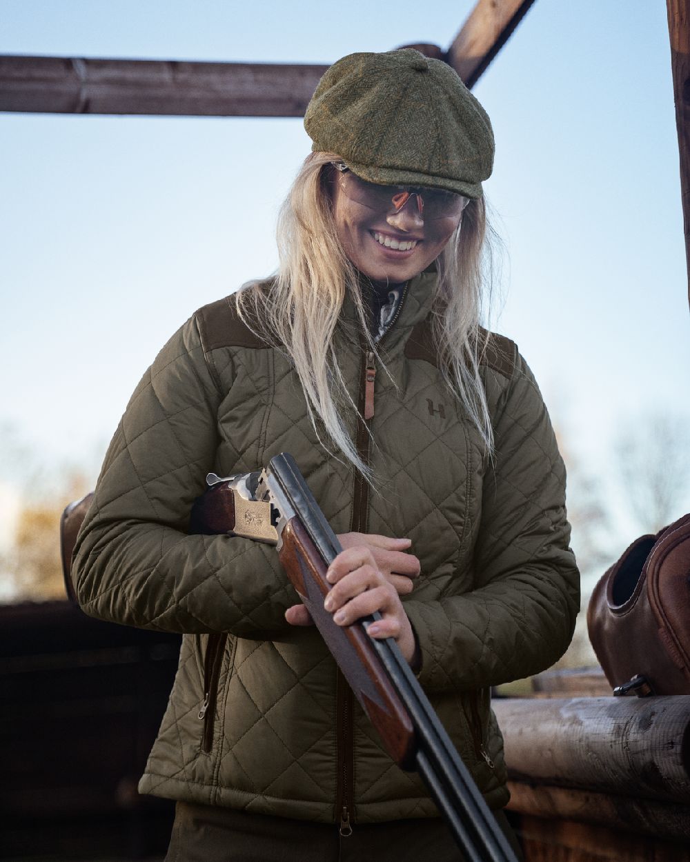 Willow Green Coloured Harkila Womens Ailsa Quilted Jacket on outdoor background