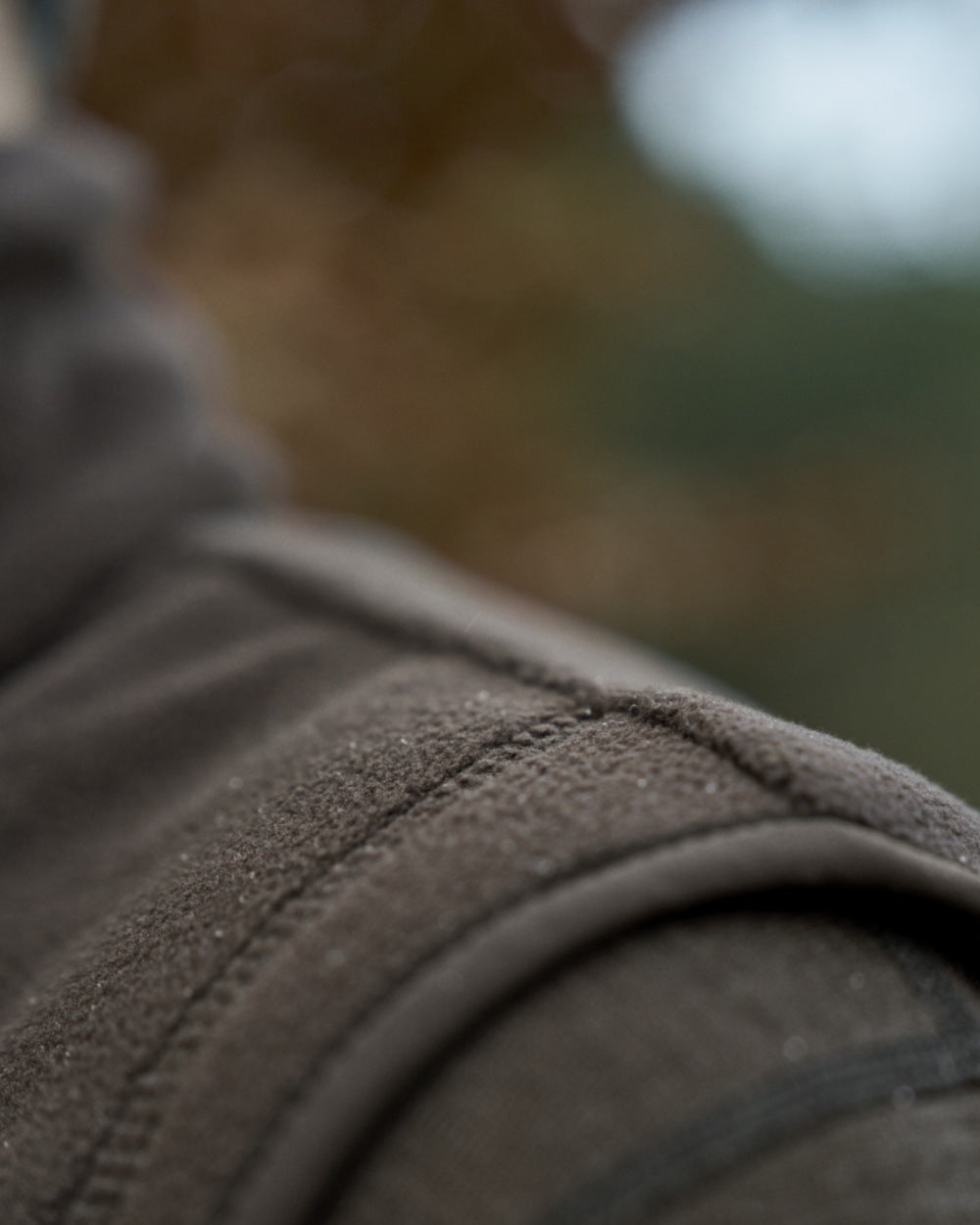 Shadow Brown Coloured Harkila Womens Aspire Fleece Waistcoat on outdoor background