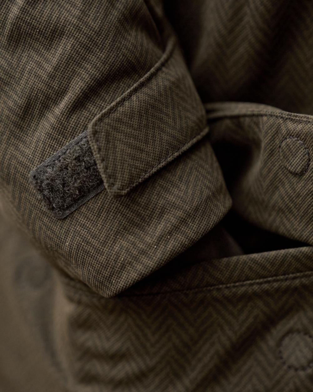 Willow Green Coloured Harkila Womens Driven Hunt HWS Insulated Jacket on forest background