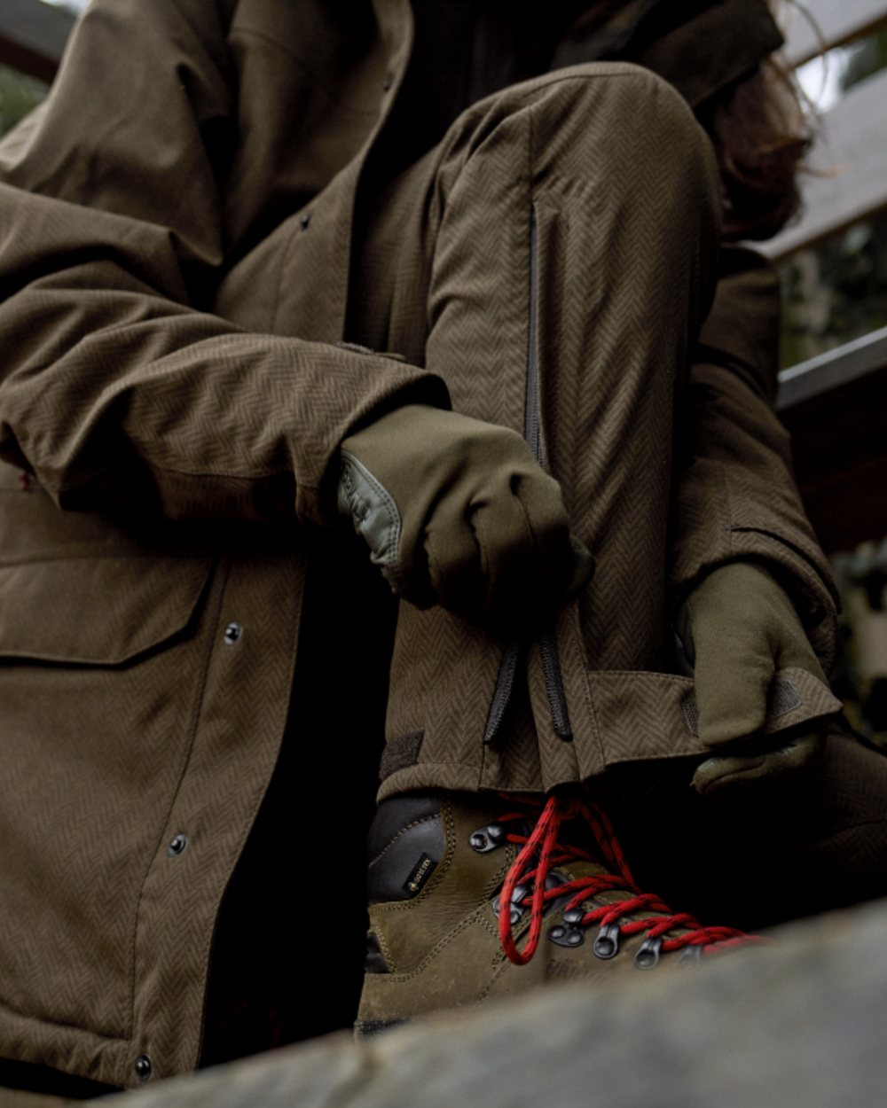 Willow Green Coloured Harkila Womens Driven Hunt HWS Insulated Trousers on forest background