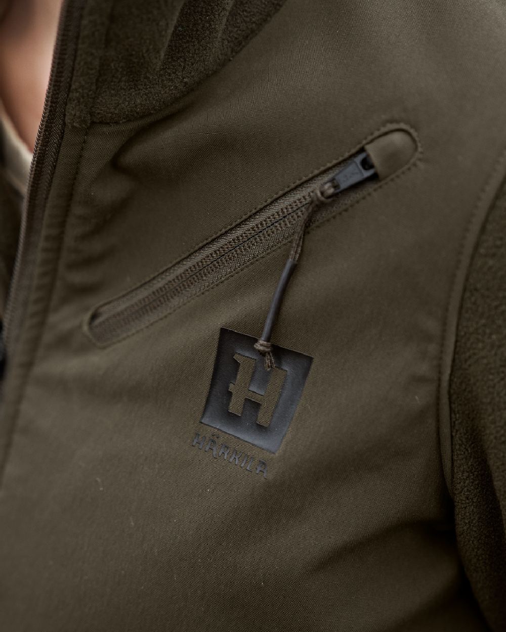 Hunting Green Willow Green Coloured Harkila Womens Fjell Fleece Jacket on blurry background