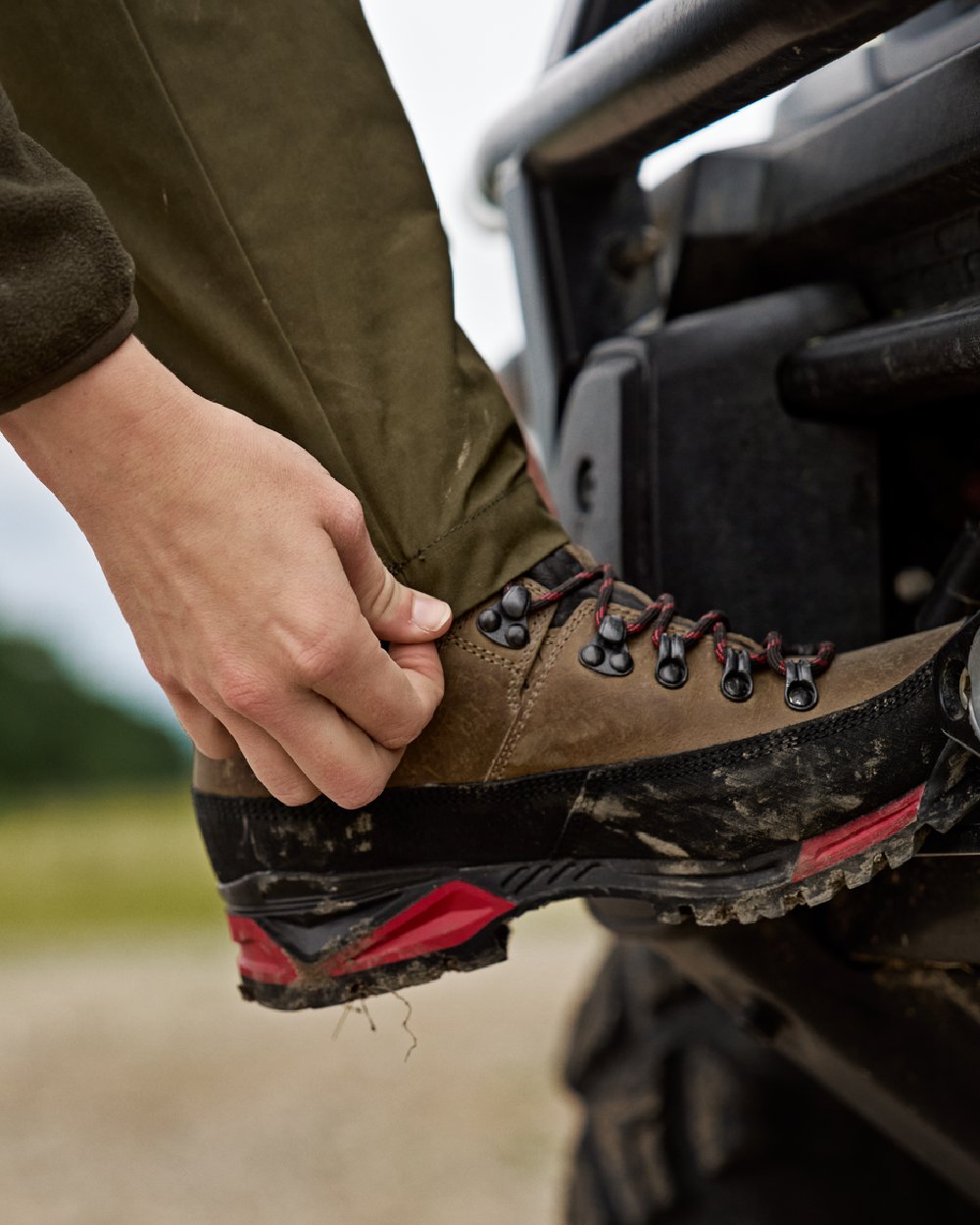 Dark Olive Willow Green Coloured Harkila Womens Fjell Trousers on blurry background