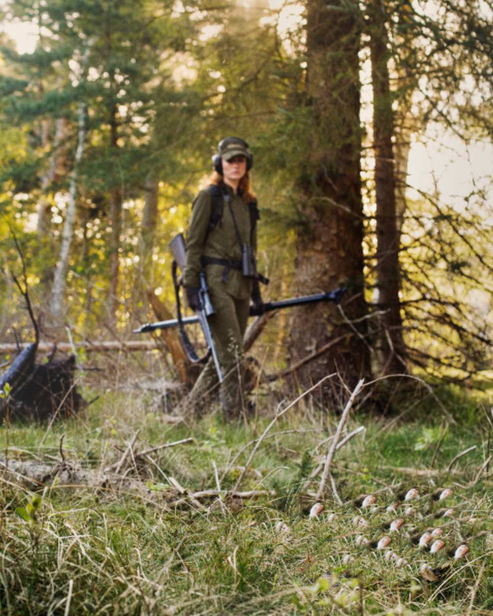 Willow Green Coloured Harkila Womens Herlet Tech Shirt on forest background