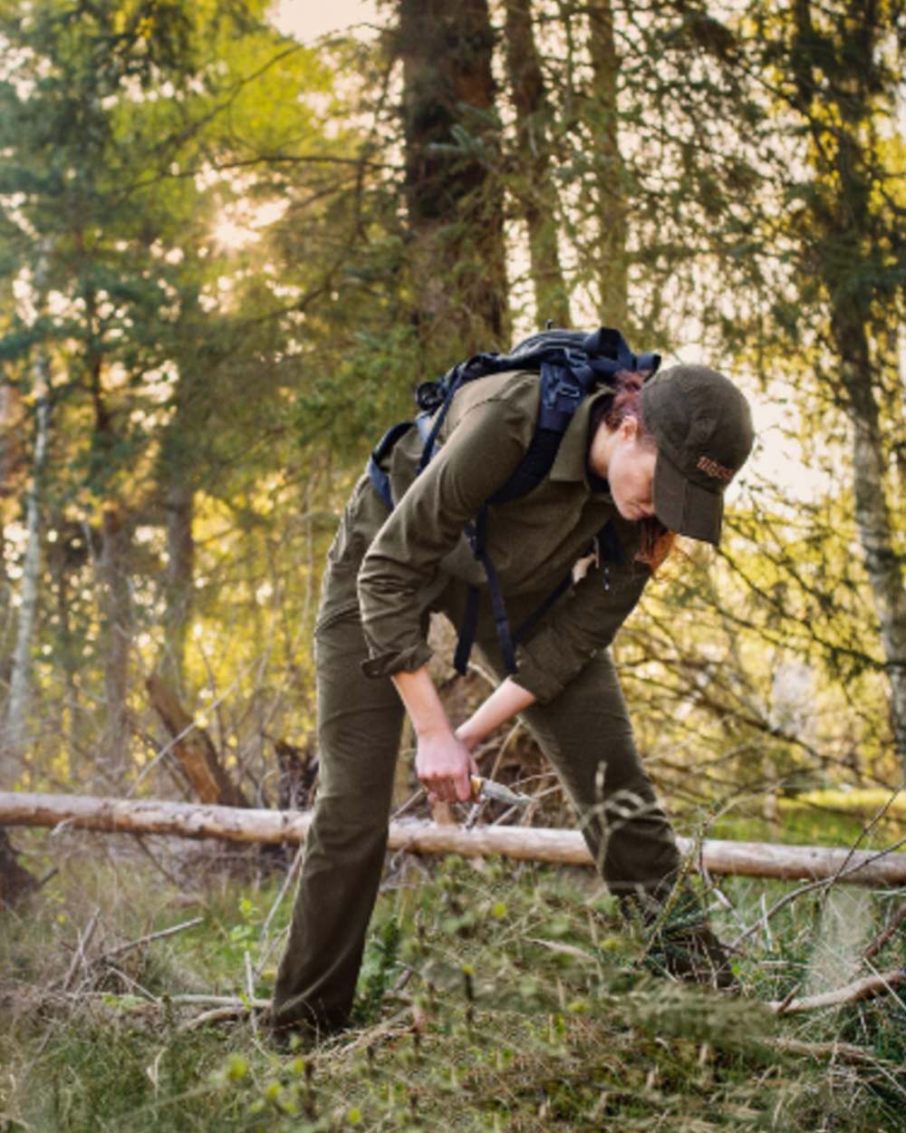 Willow Green Coloured Harkila Womens Herlet Tech Shirt on forest background