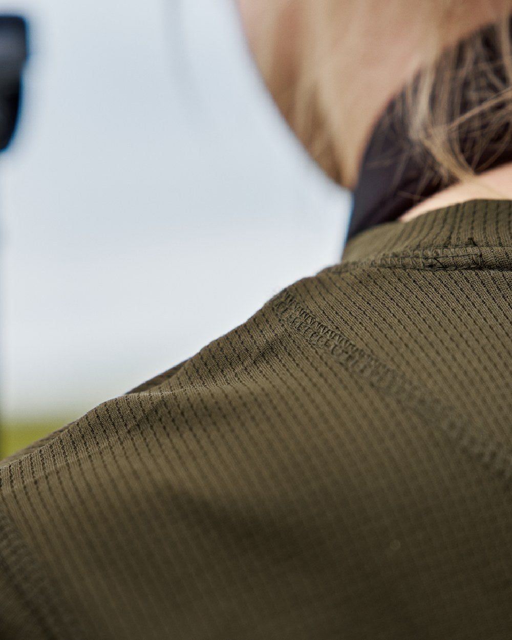 Willow Green Coloured Harkila Womens Instinct Long Sleeve T-Shirt on blurry background