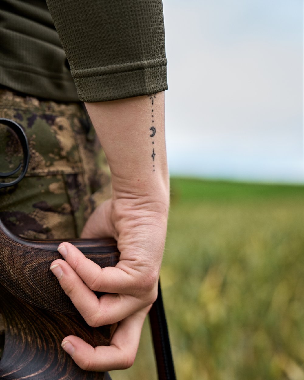 Willow Green Coloured Harkila Womens Instinct Long Sleeve T-Shirt on blurry background
