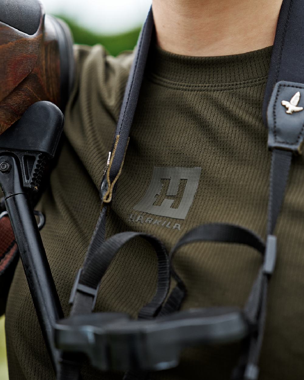 Willow Green Coloured Harkila Womens Instinct Long Sleeve T-Shirt on blurry background