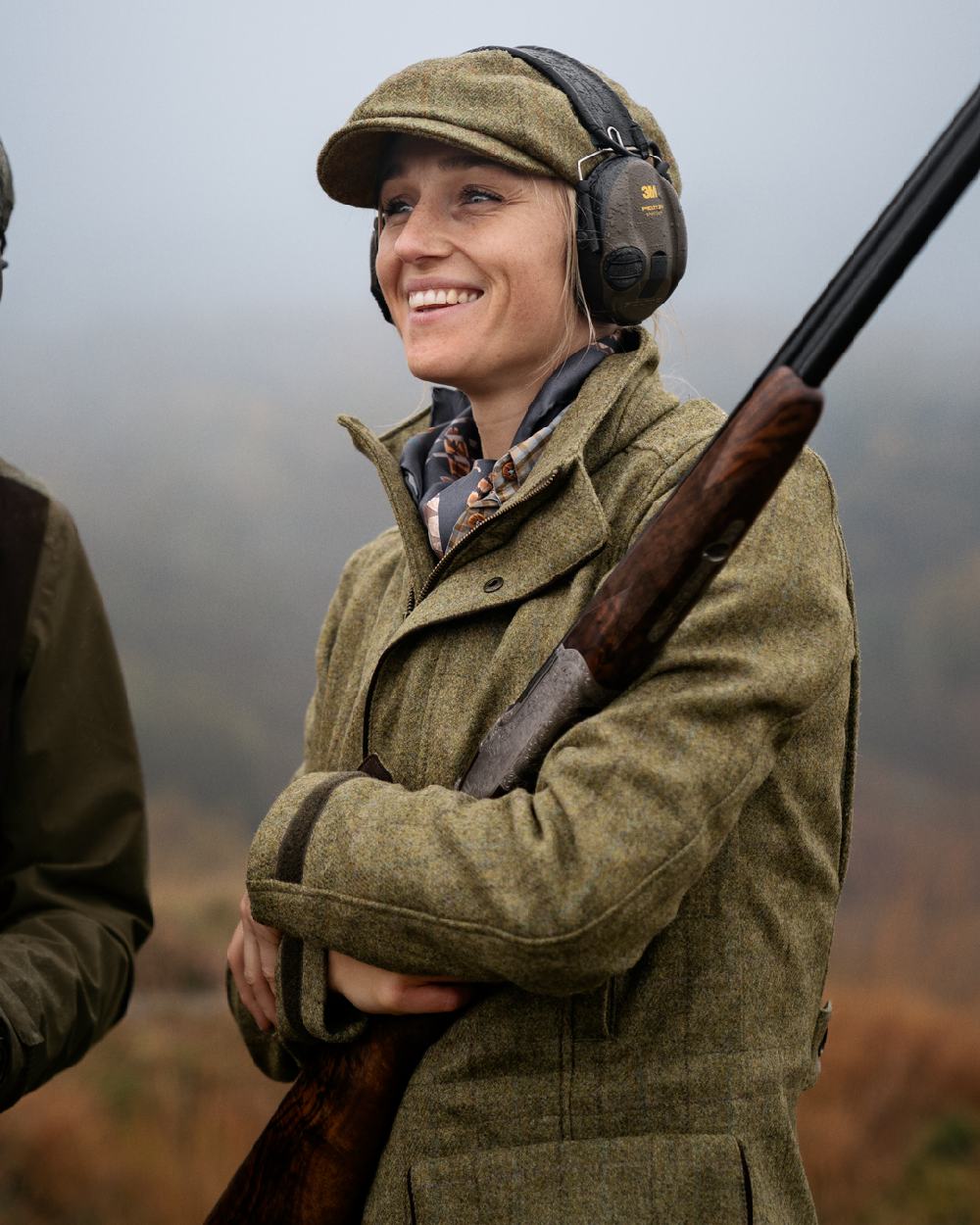 Olive Coloured Harkila Womens Jura GTX Jacket on fog background