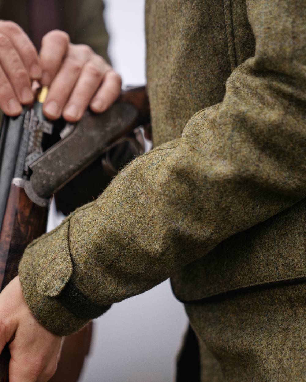 Olive Coloured Harkila Womens Jura GTX Jacket on fog background