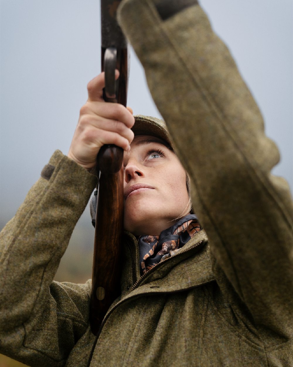 Olive Coloured Harkila Womens Jura GTX Jacket on fog background