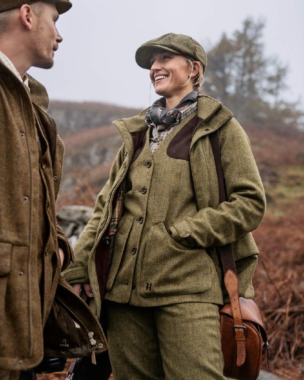 Olive Coloured Harkila Womens Jura Shooting Waistcoat on forest background