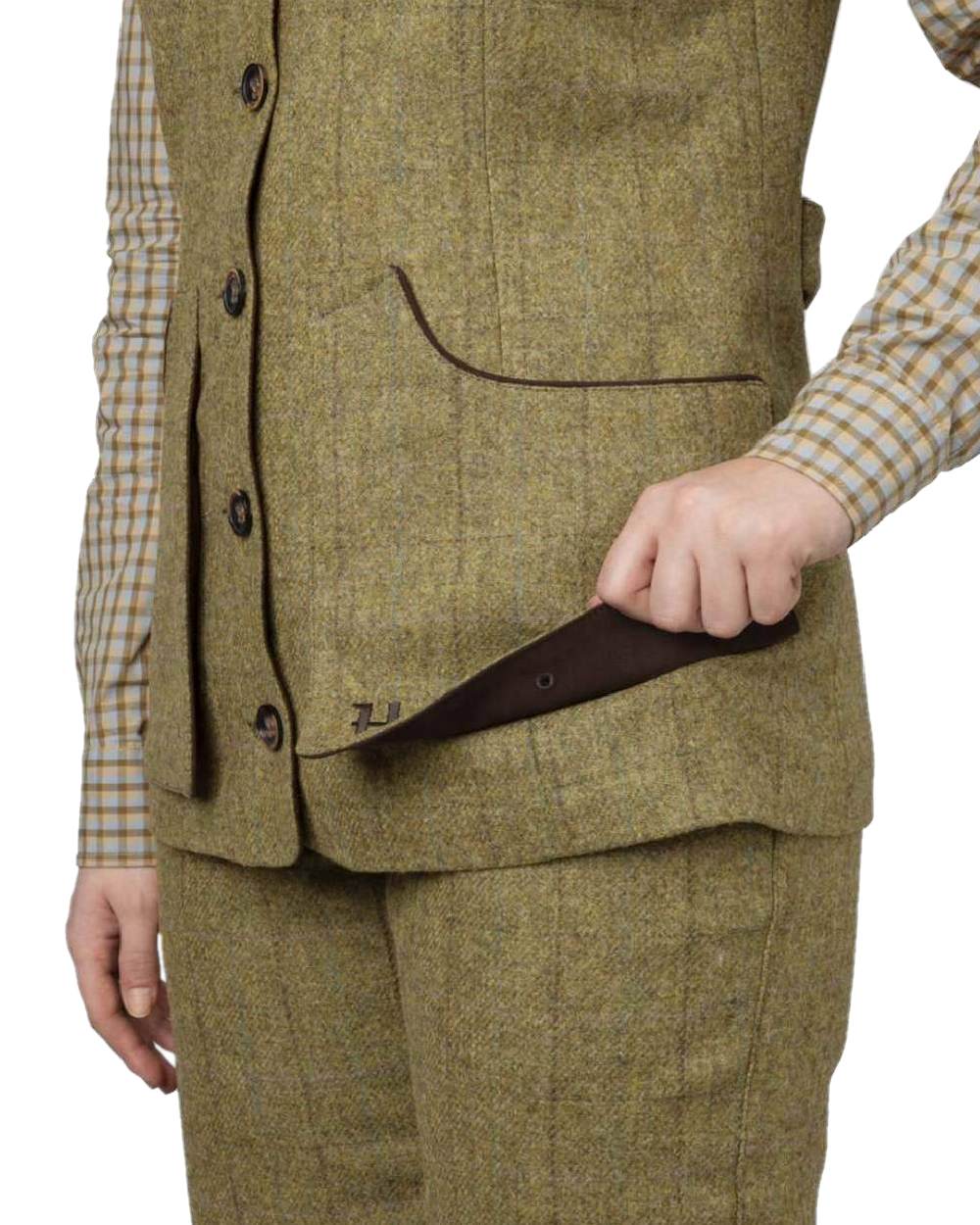 Olive Coloured Harkila Womens Jura Shooting Waistcoat on white background