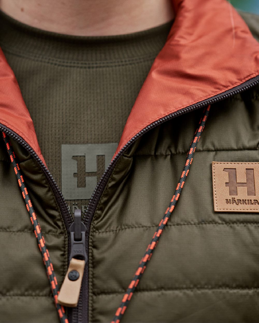 Willow Green Arabian Spice Coloured Harkila Womens Kalix HSP Waistcoat on blurry background