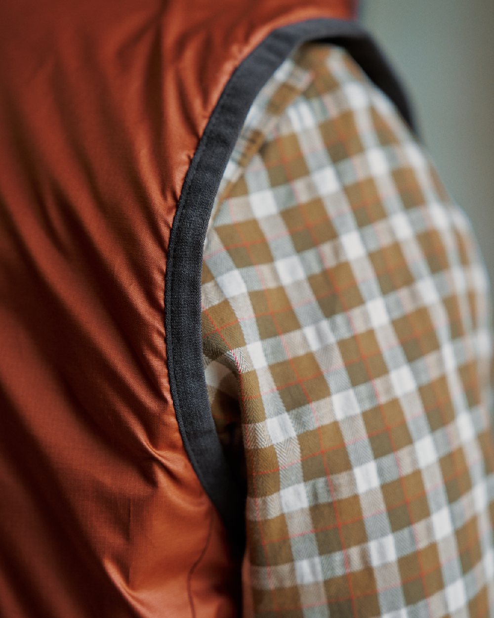 Willow Green Arabian Spice Coloured Harkila Womens Kalix HSP Waistcoat on blurry background