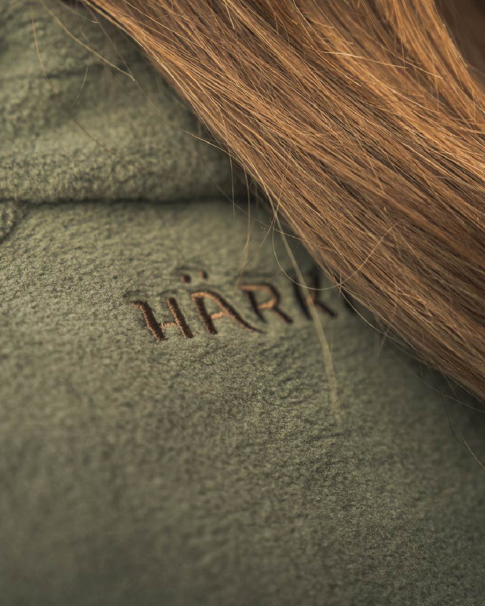 Grape Leaf Coloured Harkila Womens Sandhem 200 Fleece Waistcoat on outdoor background