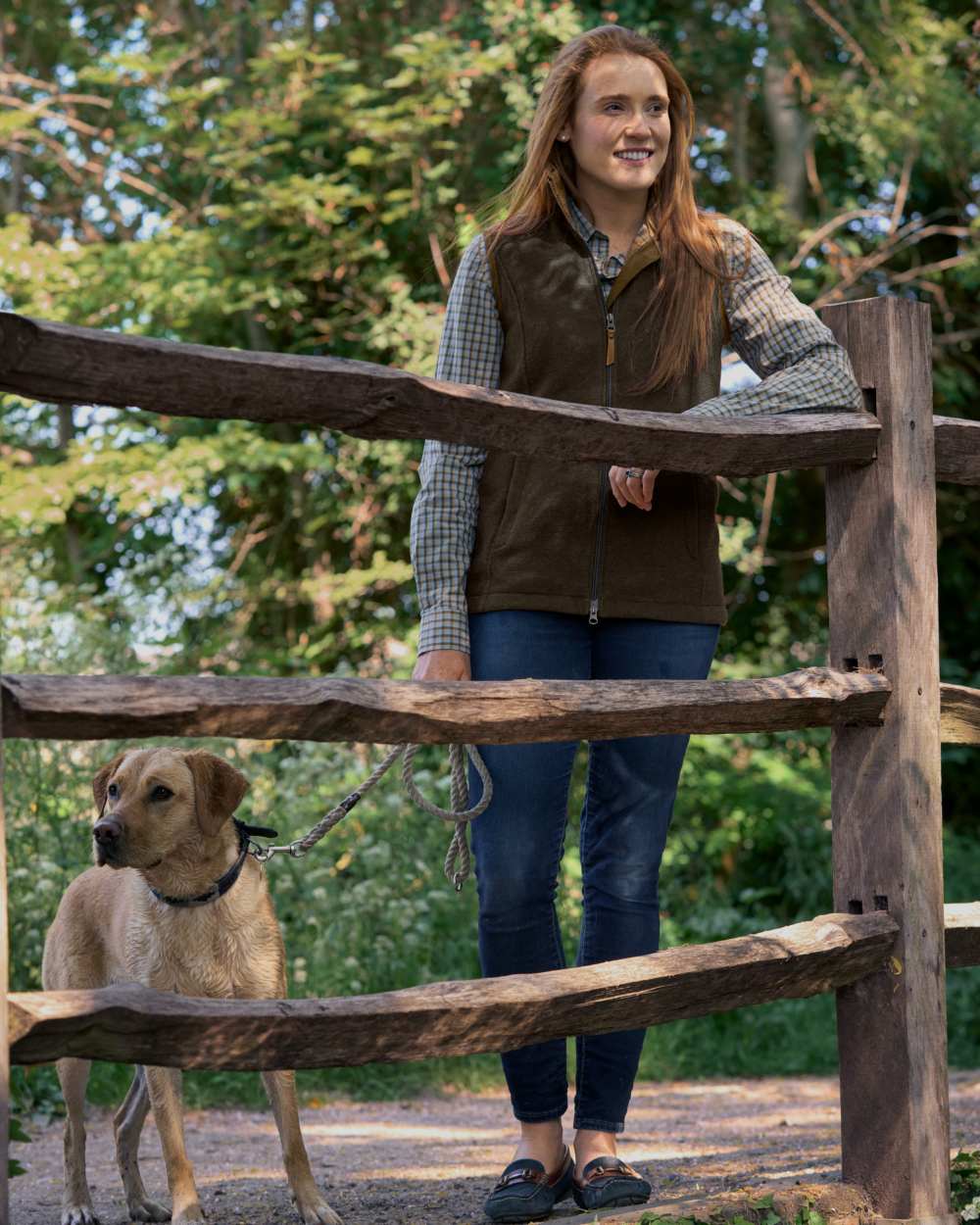 Willow Green Coloured Harkila Womens Sandhem Pro Waistcoat on forest background