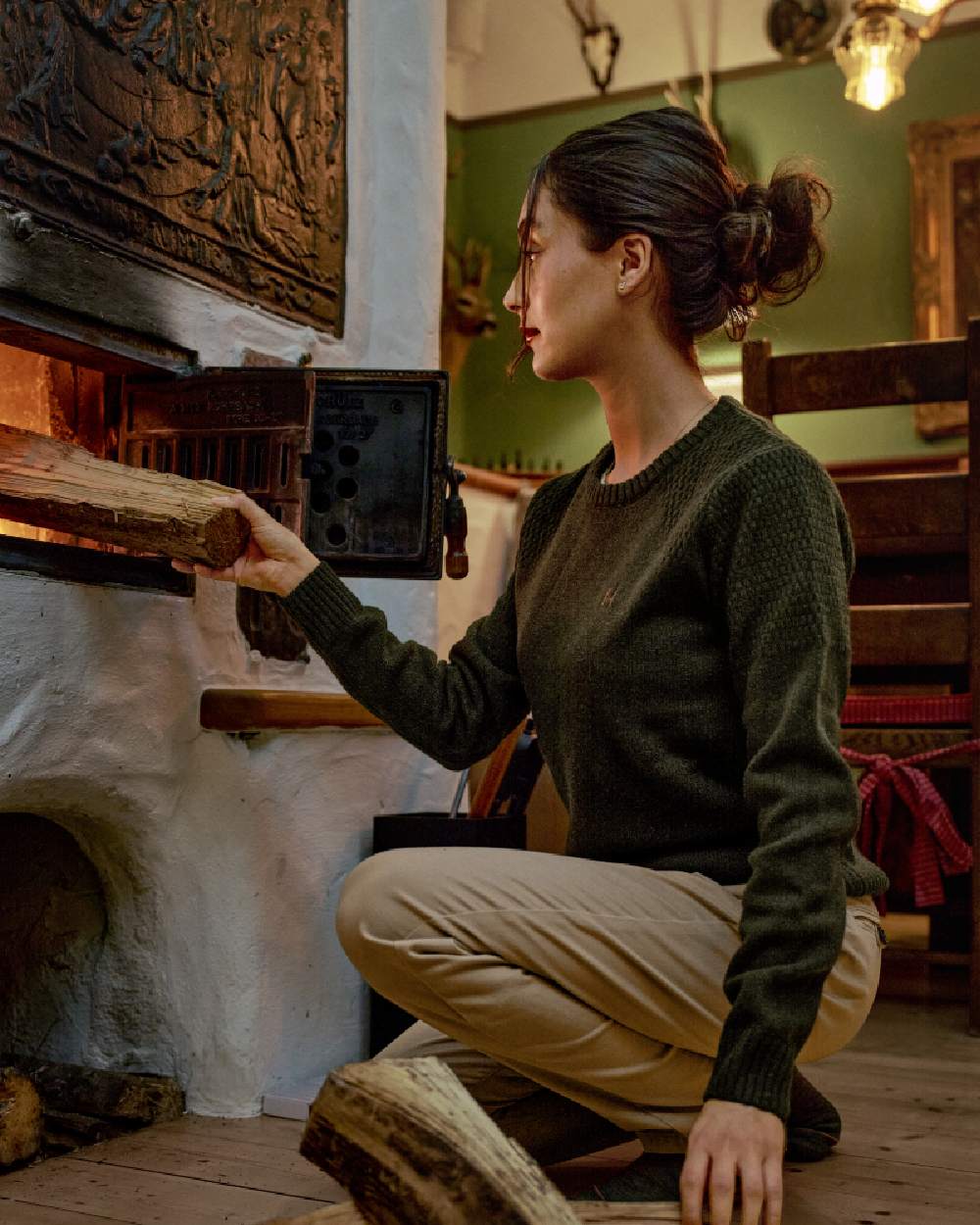 Rosin Coloured Harkila Womens Vinnie Merino Pullover on indoor background