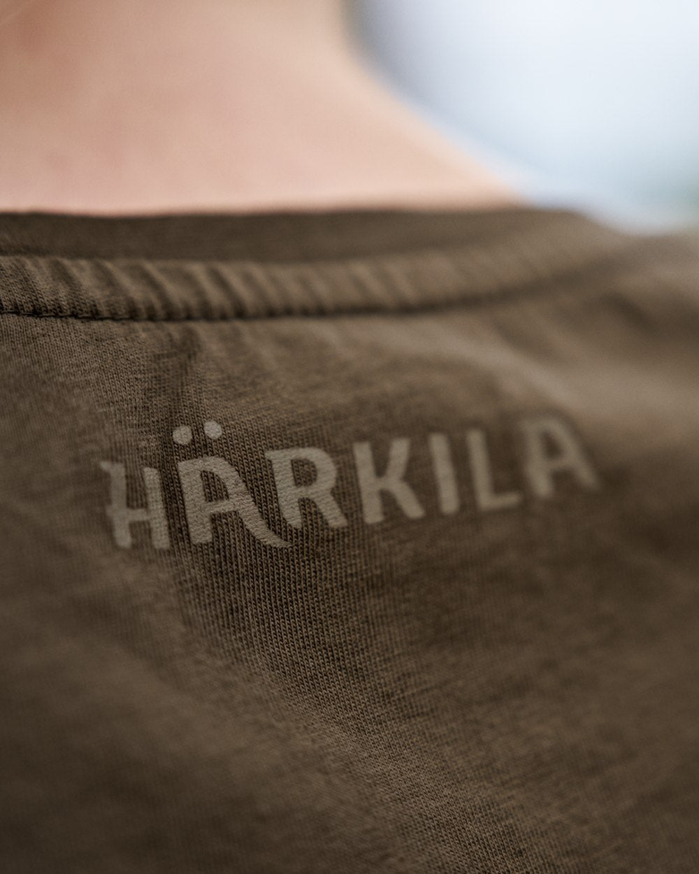 Willow Green Coloured Harkila Womens Wildboar Short Slevee T-Shirt on outdoor background