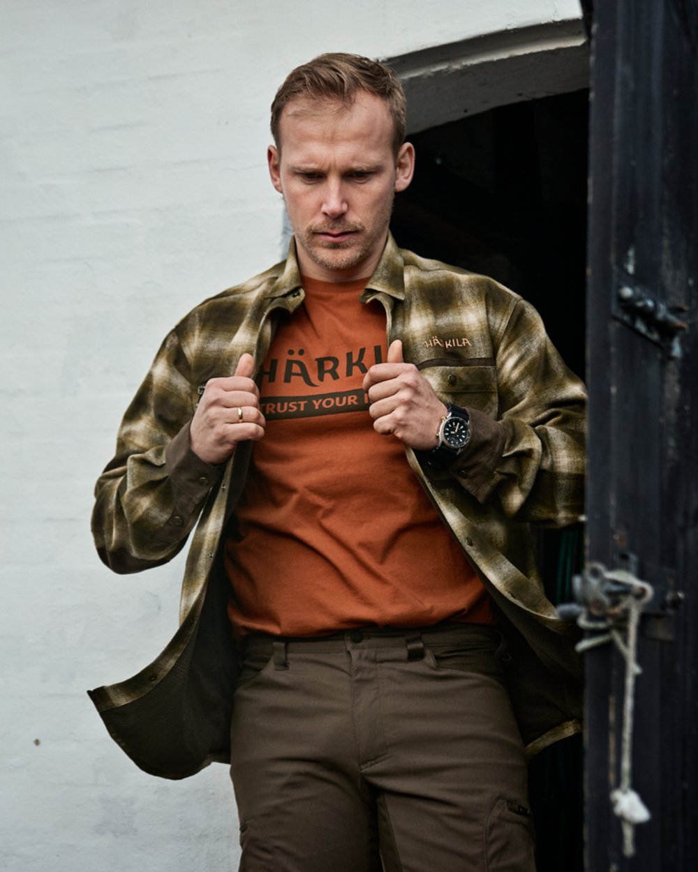 Arabian Spice Coloured Harkila logo Short Sleeve T-Shirt on white background