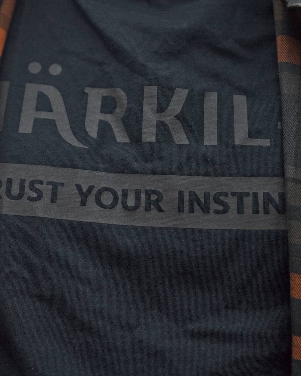 Dark Navy Coloured Harkila logo Short Sleeve T-Shirt on white background