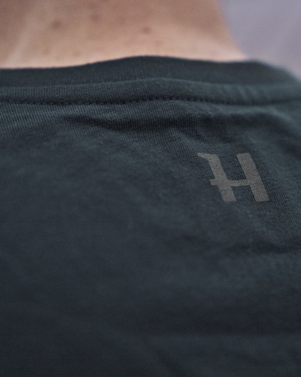 Dark Navy Coloured Harkila logo Short Sleeve T-Shirt on white background
