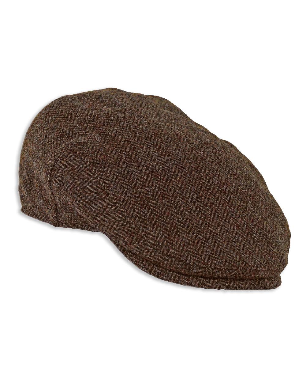 Otter coloured Heather Chapman Shetland Wool Tweed Flat Cap on white background
