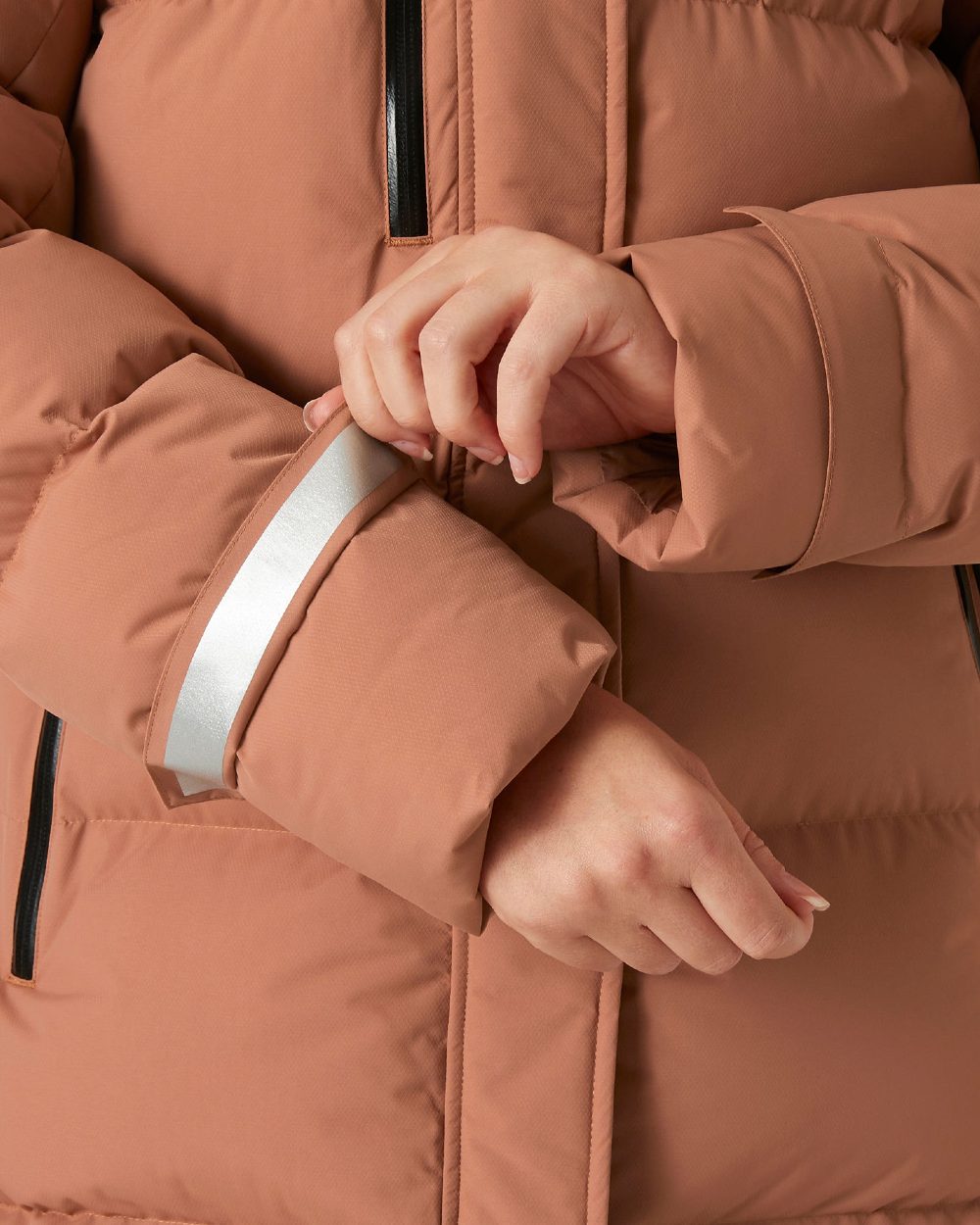 Cedarwood Coloured Helly Hansen Adore Ladies Puffy Parka on white background