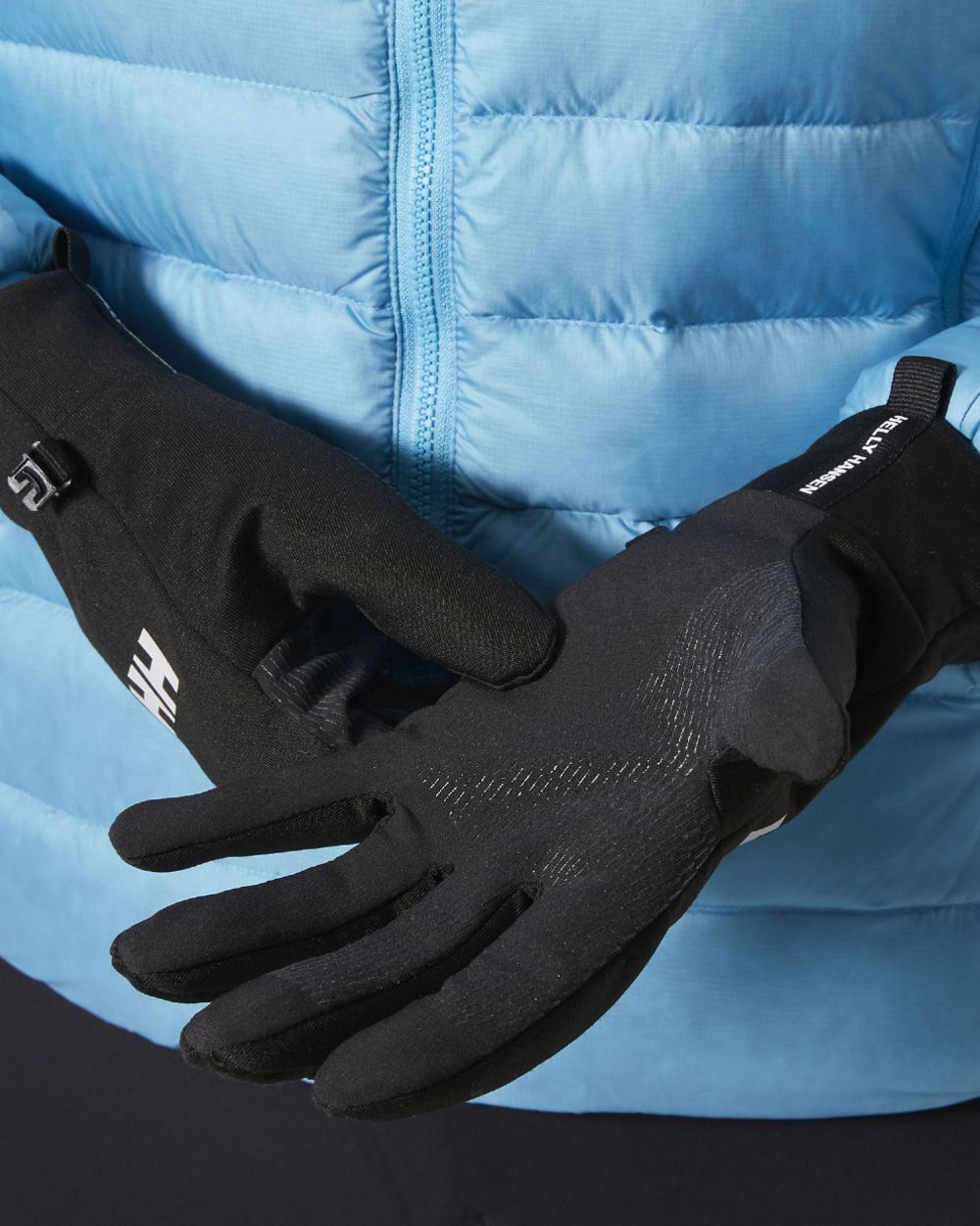 Black Coloured Helly Hansen Hardface Fleece Touch Gloves on white background