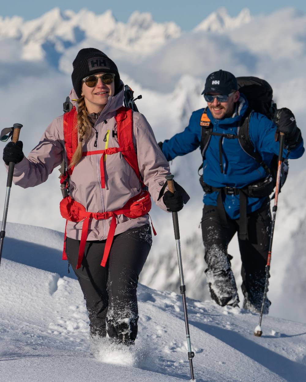 Navy Coloured Helly Hansen Logo Cap on snow background