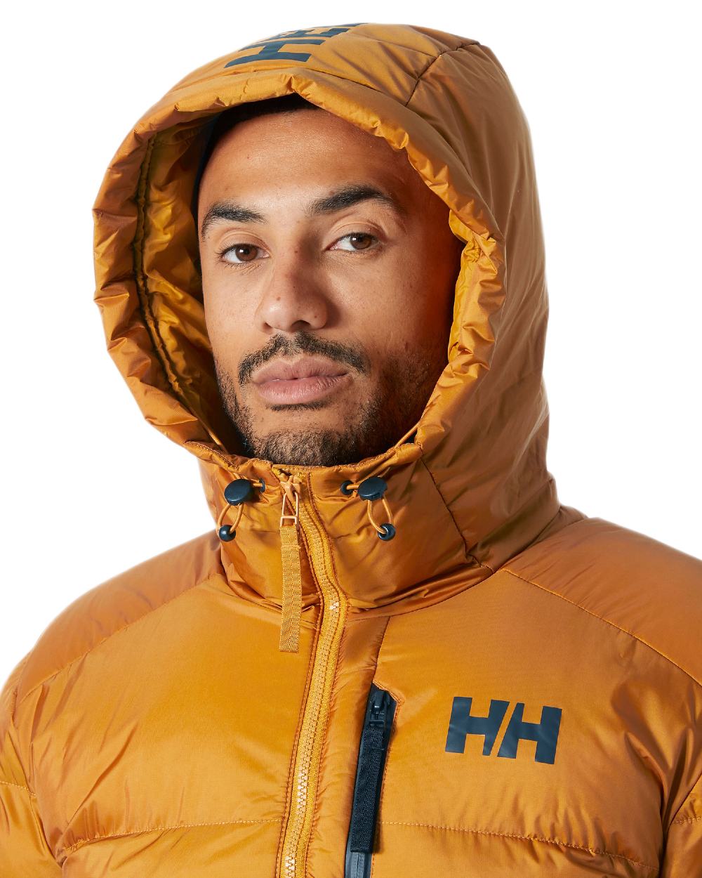 Mustard Coloured Helly Hansen Mens Active Winter Parka on white background