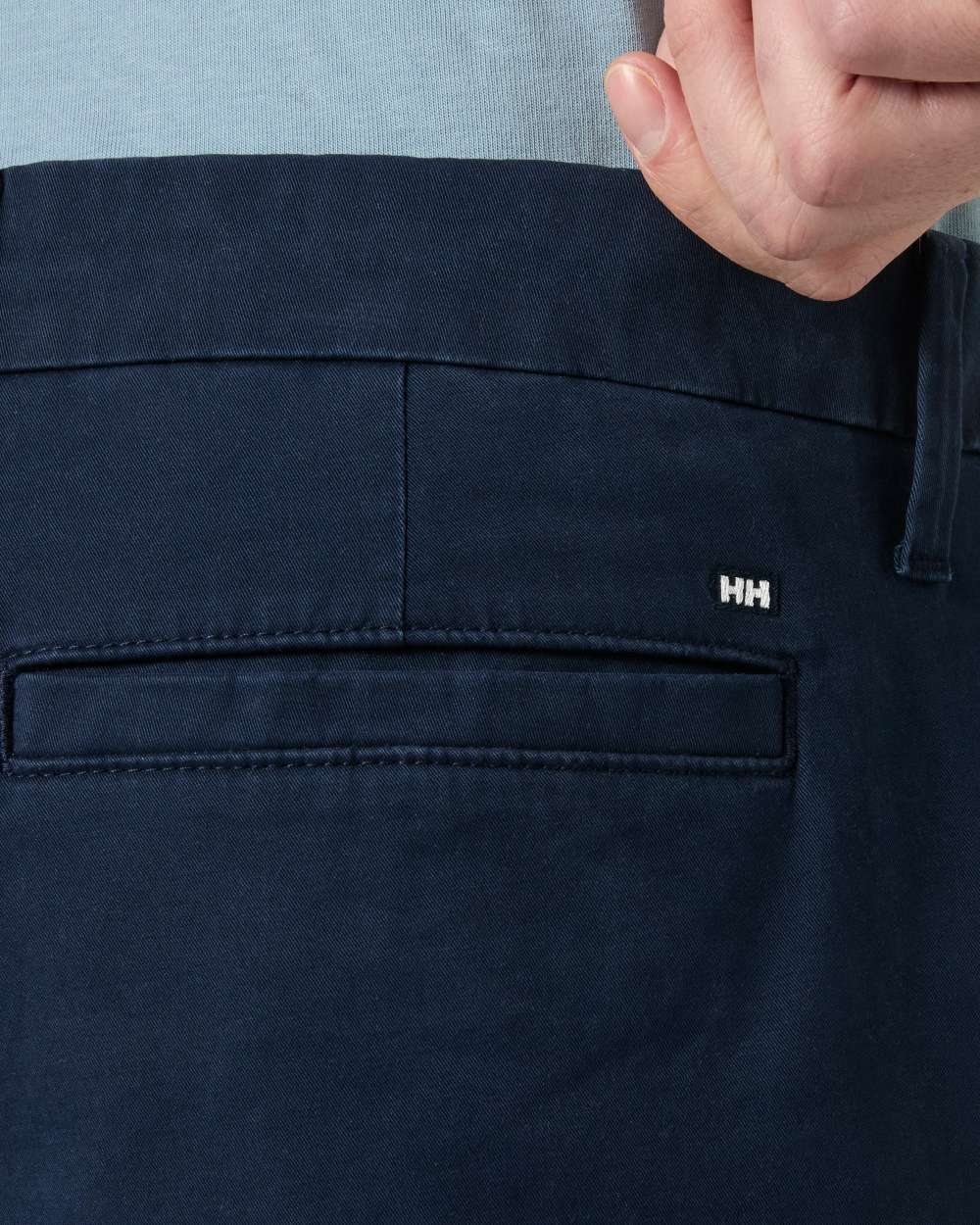 Navy coloured Helly Hansen Mens Bryggen Chino Shorts on white background