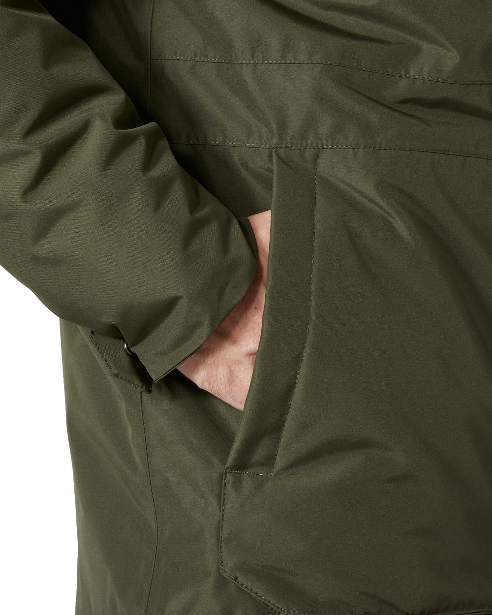 Utility Green coloured Helly Hansen Mens Coastal 3.0 Parka on white background