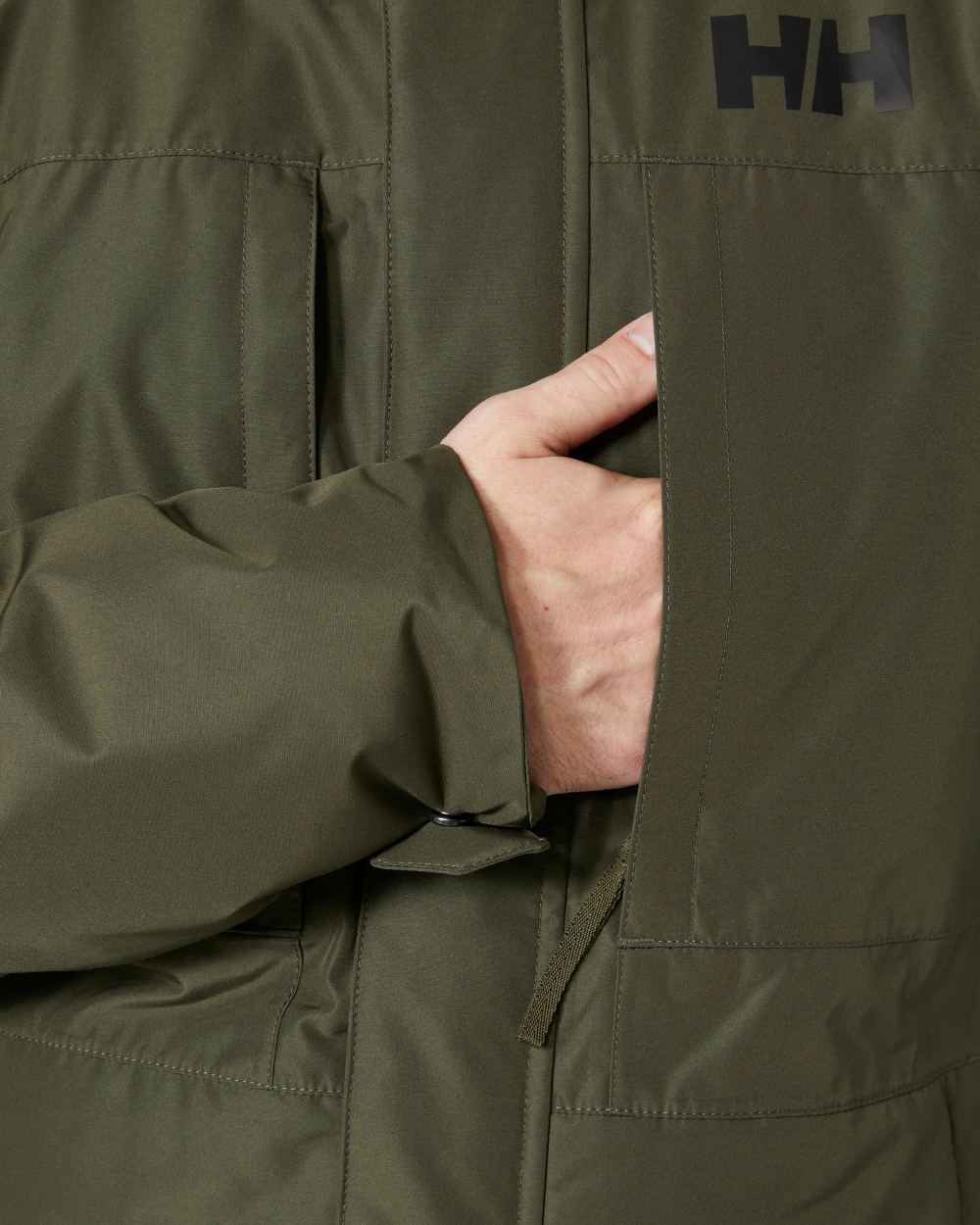 Utility Green coloured Helly Hansen Mens Coastal 3.0 Parka on white background