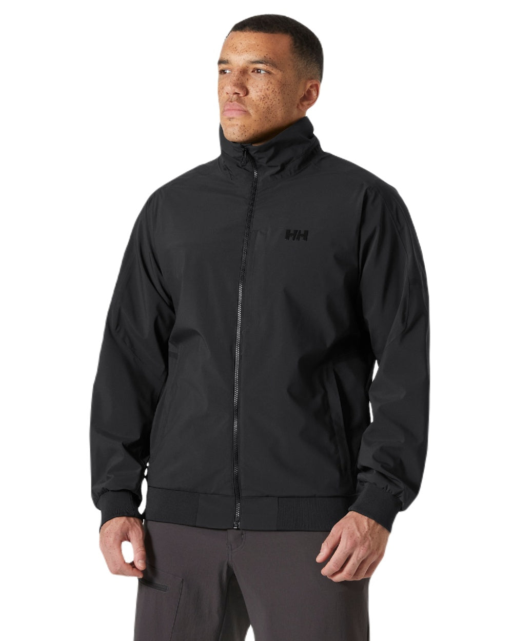 Ebony coloured Helly Hansen Mens HP Racing Bomber Jacket 3.0 on white background