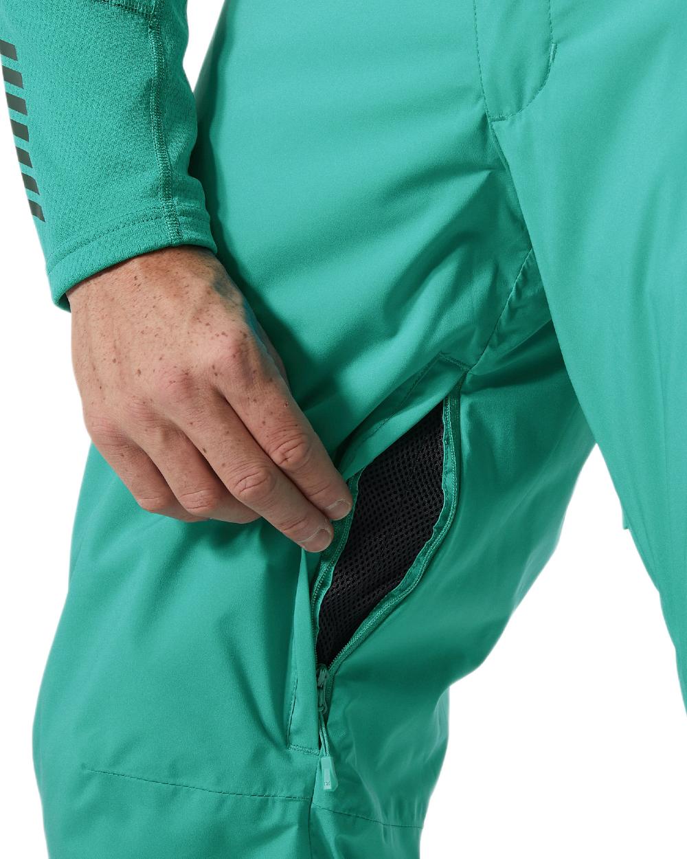 Signal Green Coloured Helly Hansen Mens Legendary Insulated Ski Pants on white background