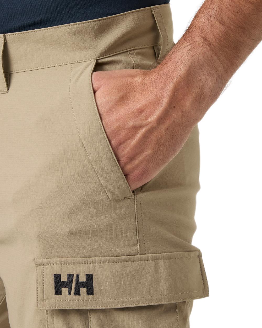 Pebble coloured Helly Hansen Mens Quick-Dry Cargo Shorts 11"on white background