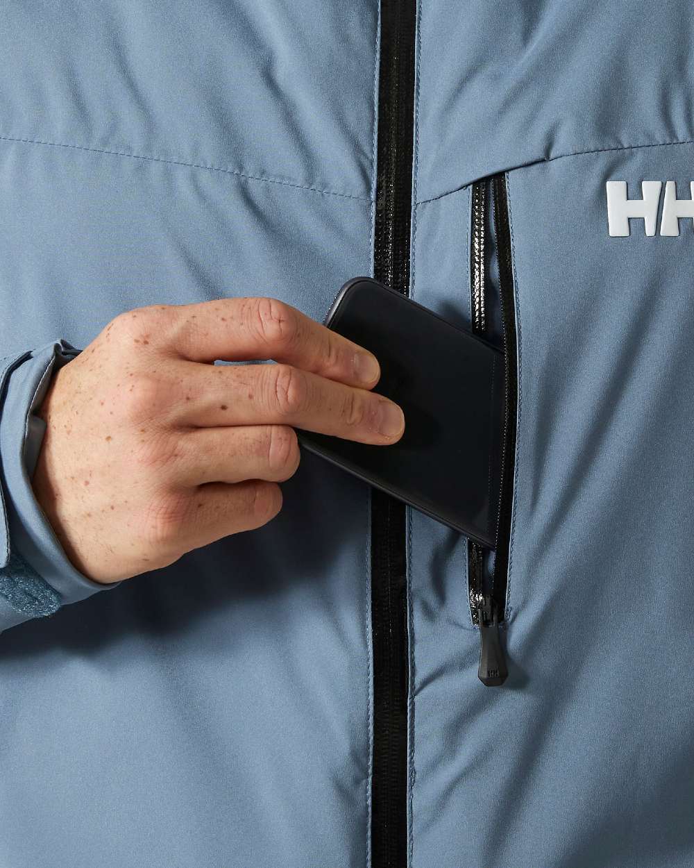 Washed Navy Coloured Helly Hansen Mens Swift Team Insulated Ski Jacket on white background