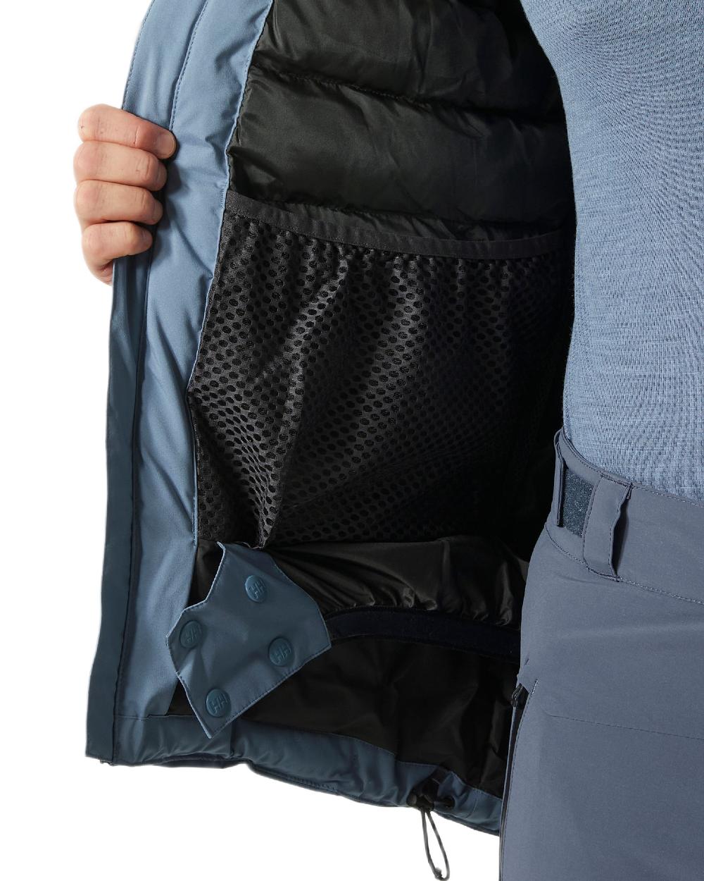 Washed Navy Coloured Helly Hansen Mens Swift Team Insulated Ski Jacket on white background