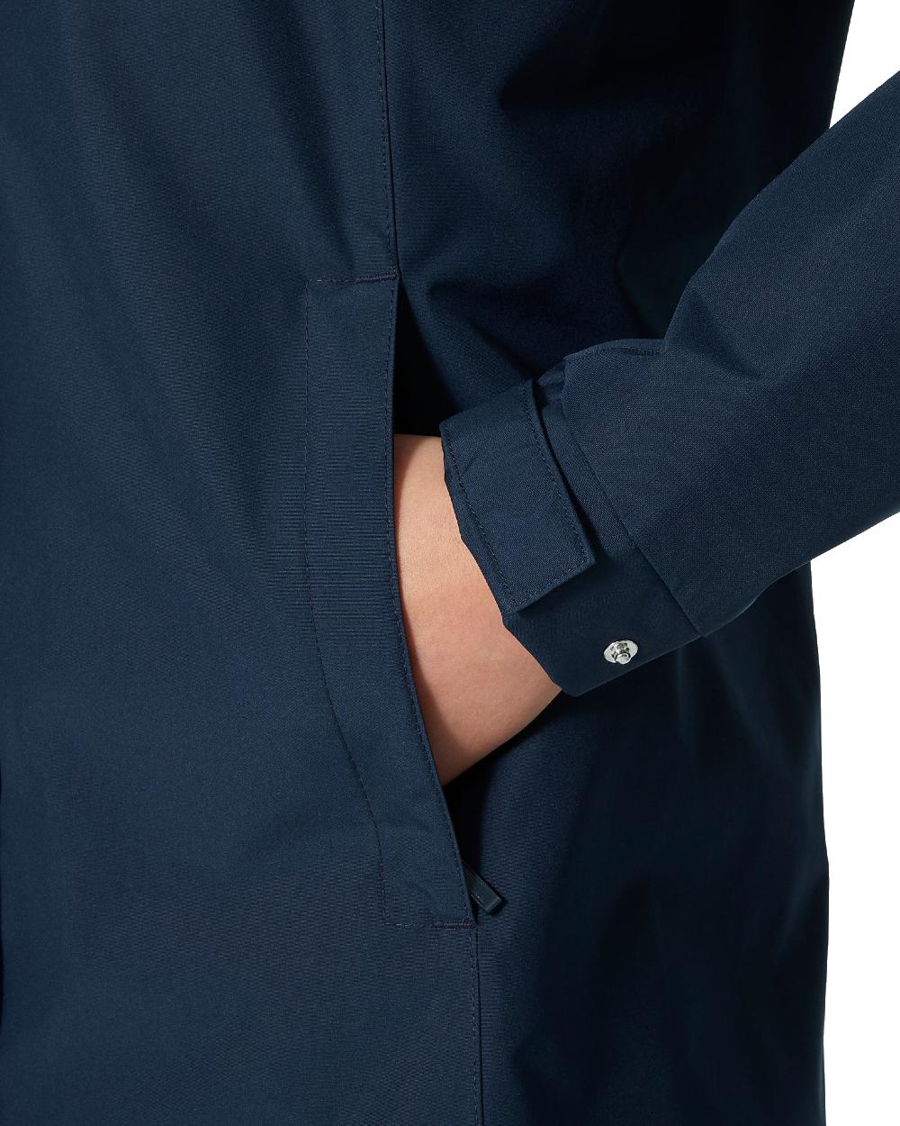Navy coloured Helly Hansen Womens Aden Long Rain Coat on white background