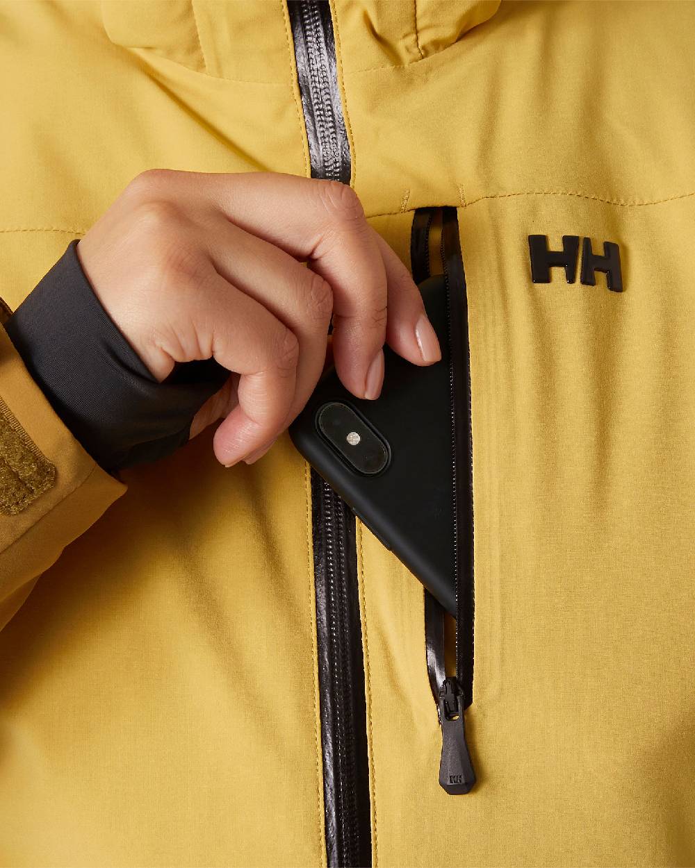 Sand Coloured Helly Hansen Womens Alphelia Ski Jacket on white background