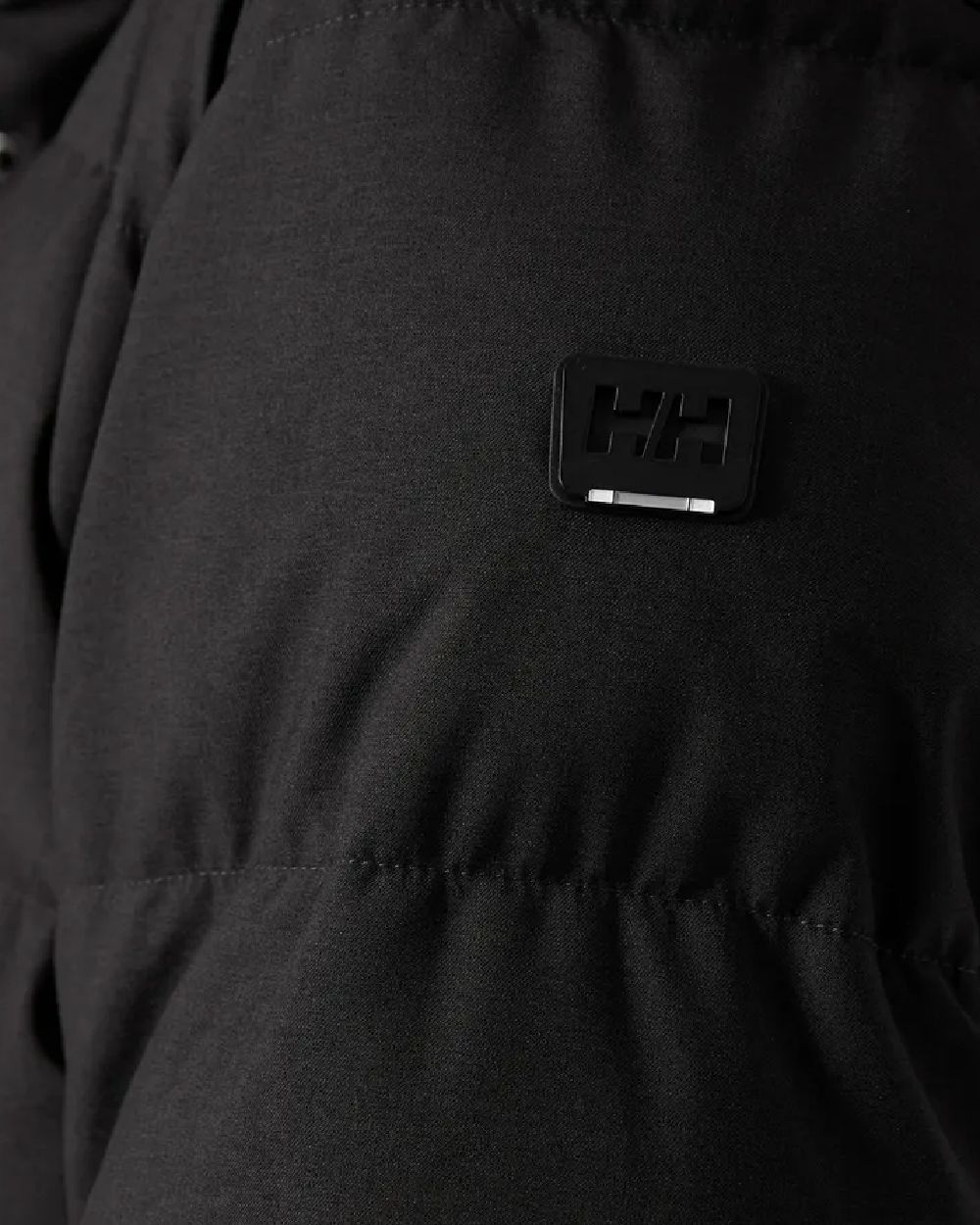 Black Coloured Helly Hansen Womens Blossom Puffy Winter Parka on white background