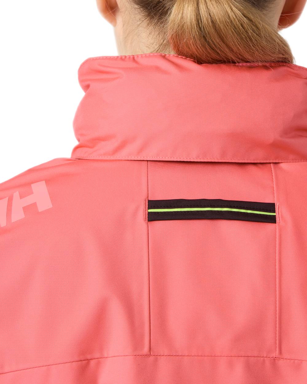 Sunset Pink Coloured Helly Hansen Womens Crew Hooded Midlayer Sailing Jacket 2.0 On A White Background