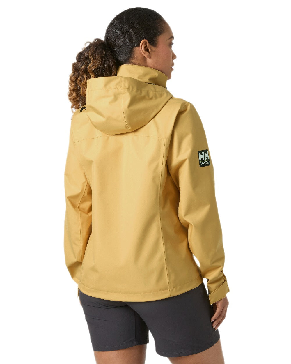 Sand Coloured Helly Hansen womens crew hooded sailing jacket 2.0 on white background