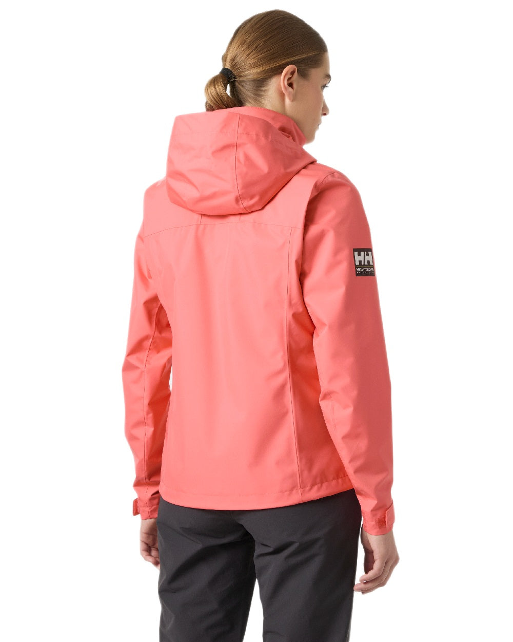 Sunset Pink Coloured Helly Hansen womens crew hooded sailing jacket 2.0 on white background