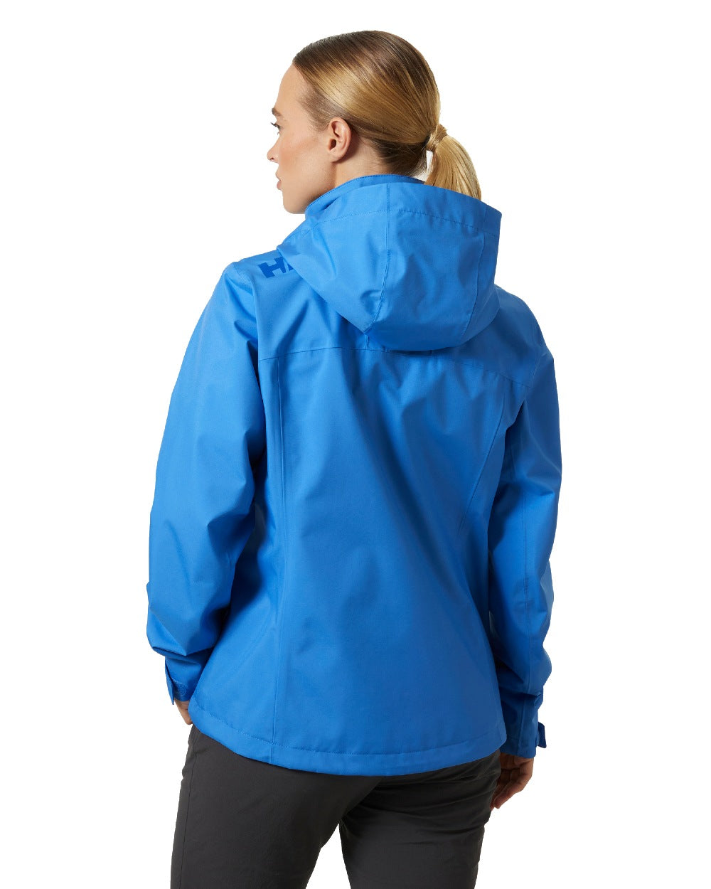 Ultra Blue coloured Helly Hansen womens crew hooded sailing jacket 2.0 on white background