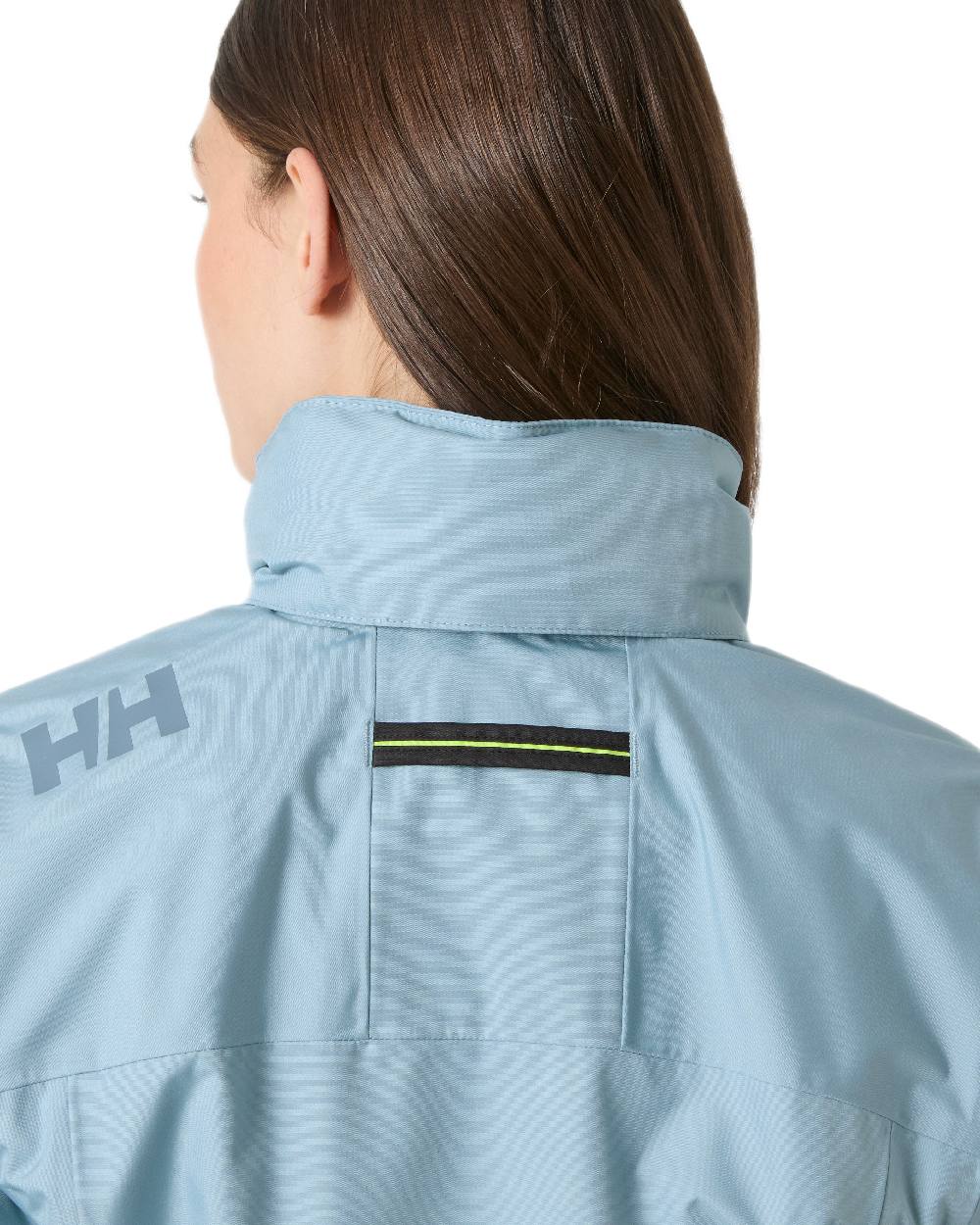 Windy Blue Coloured Helly Hansen womens crew hooded sailing jacket 2.0 on white background