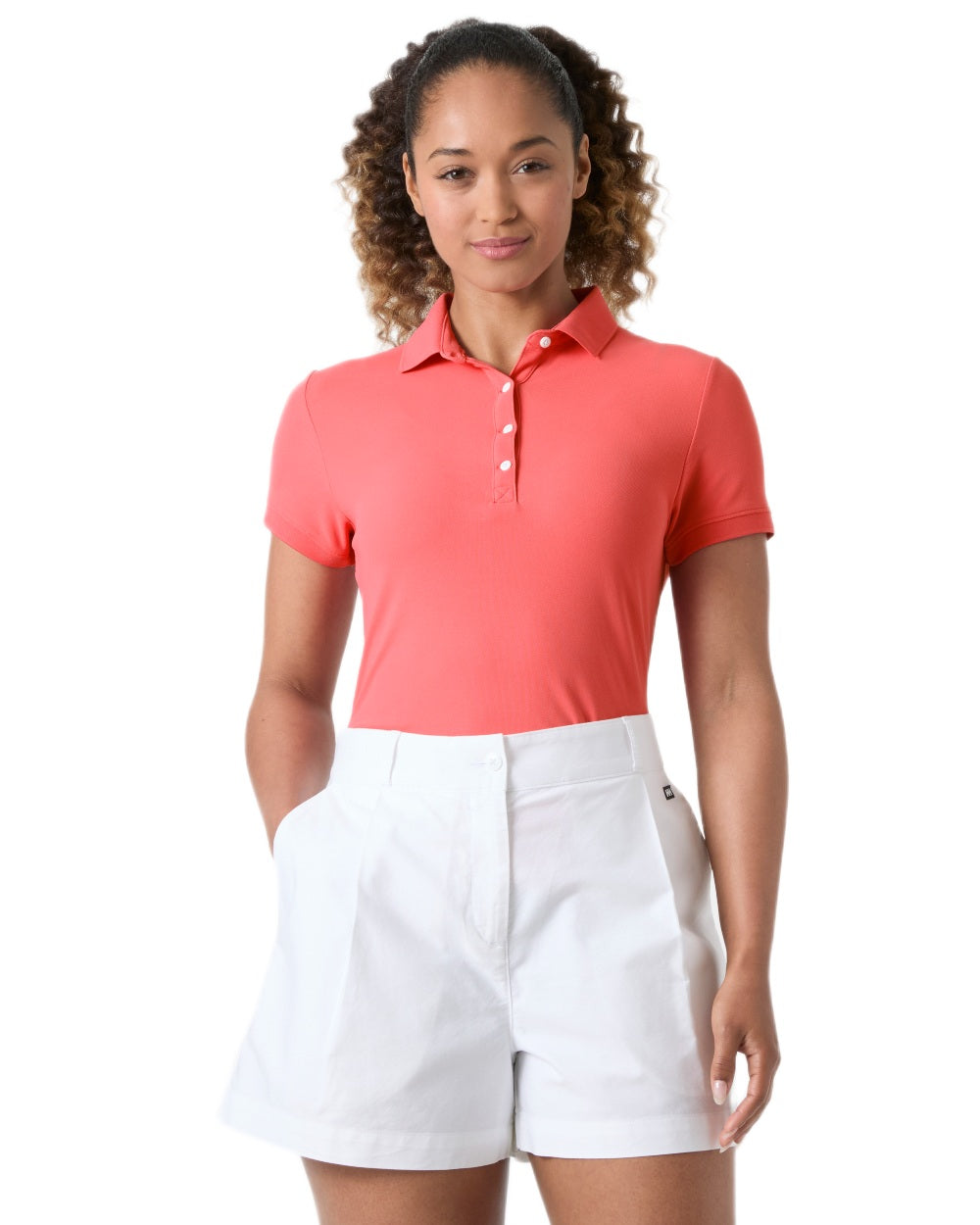 Sunset Pink coloured Helly Hansen Womens Polo on White background