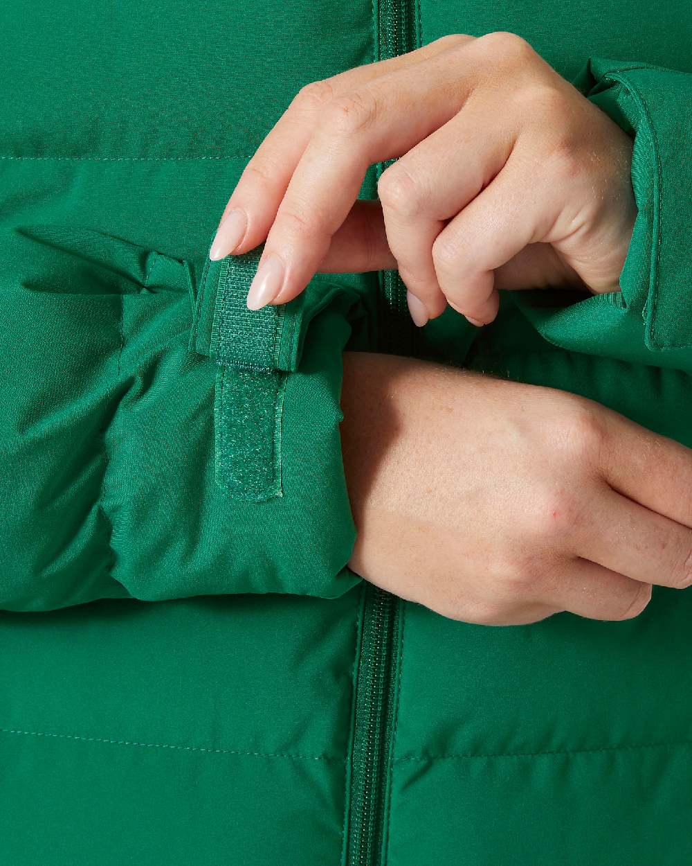 Emerald Coloured Helly Hansen Womens Imperial Puffy Jacket on white background