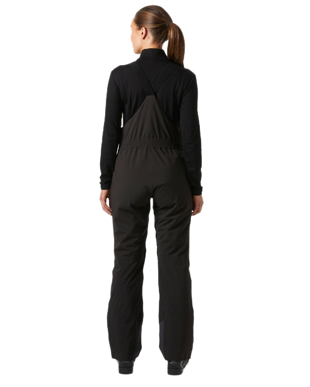 Black Coloured Helly Hansen Womens Legendary Insulated Bib Pants on white background